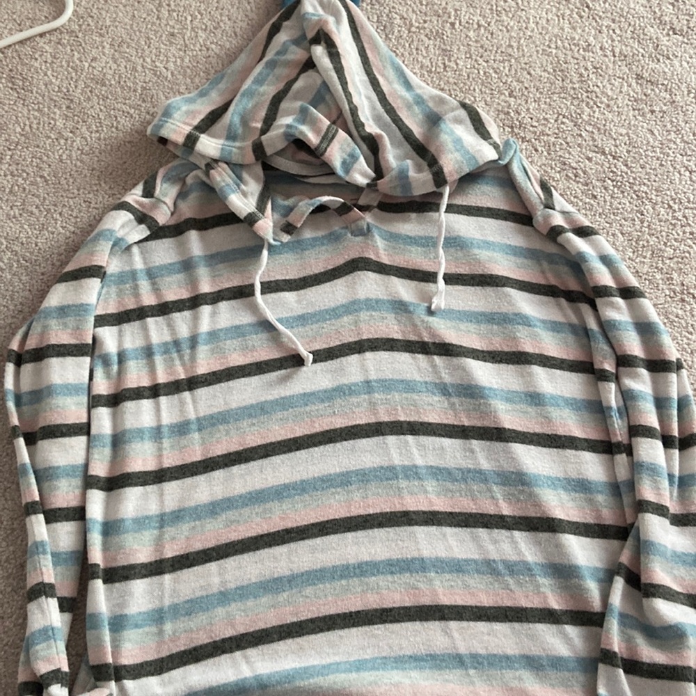 A multi colored sweatshirt with draw strings in perfect condition never worn.